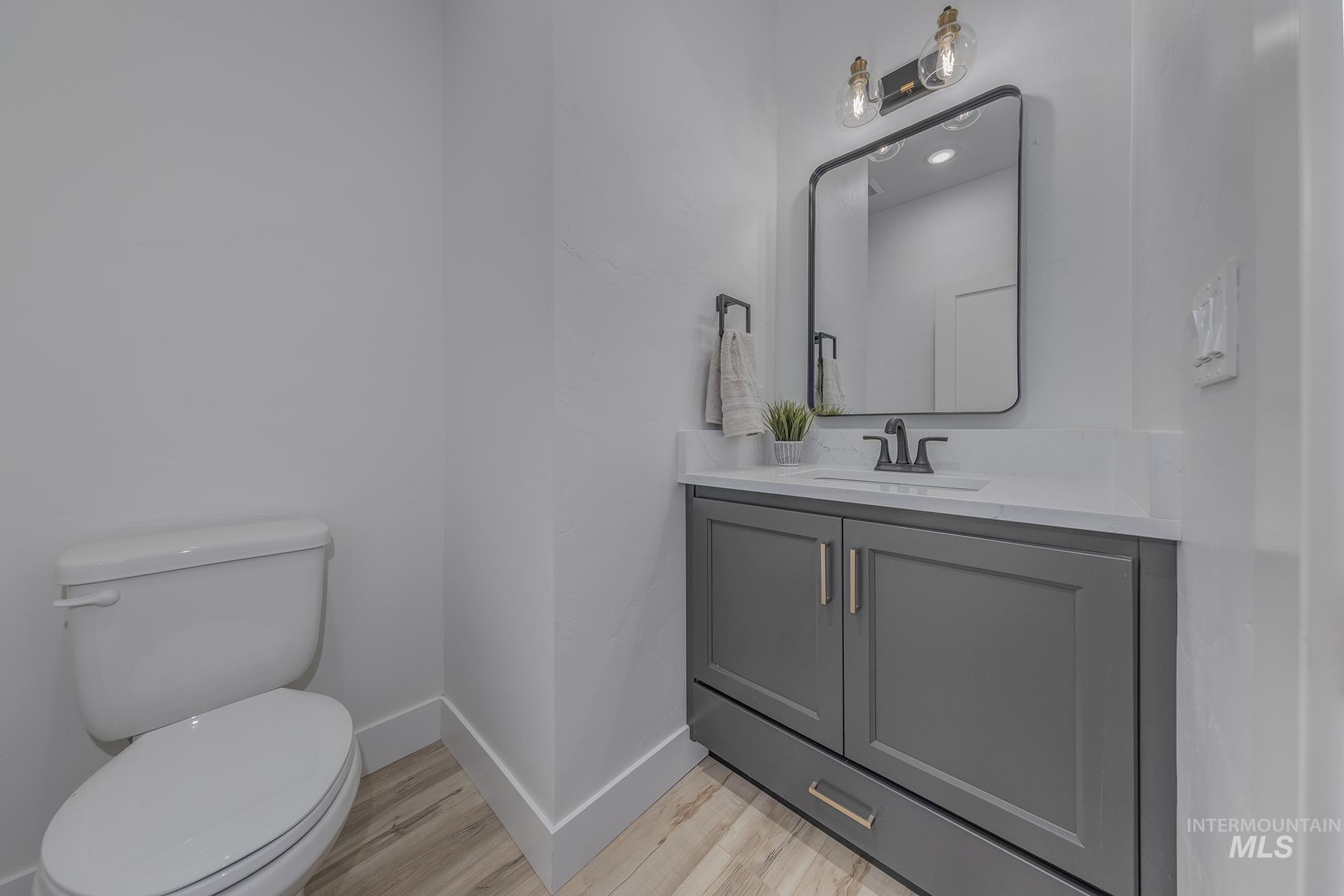 2810 Cypress Point Payette, ID 83661 - Photo 27 of 46 Bathroom with vanity and light wood-style flooring