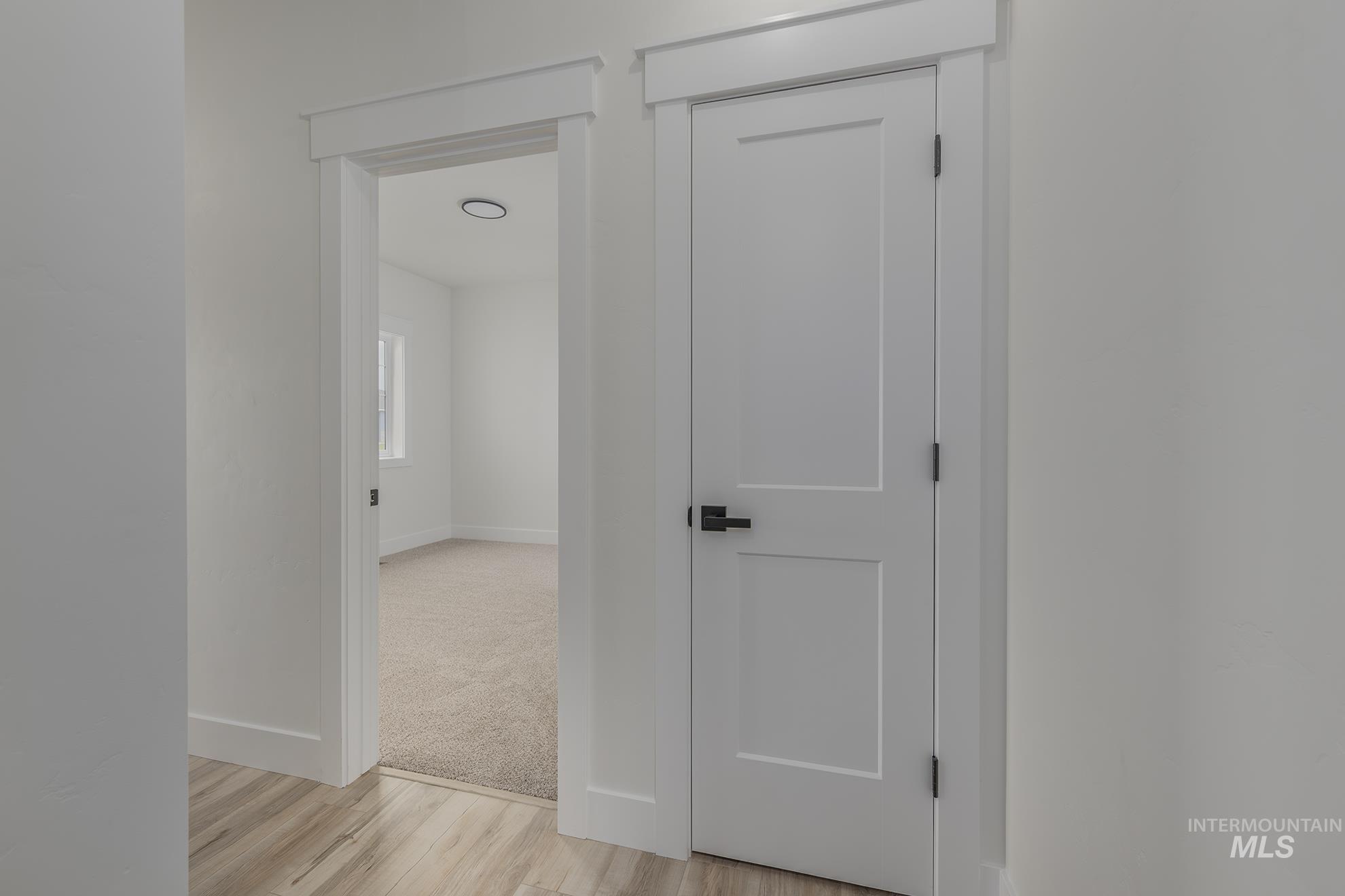 2810 Cypress Point Payette, ID 83661 - Photo 28 of 46 Hallway with light wood-style floors and baseboards