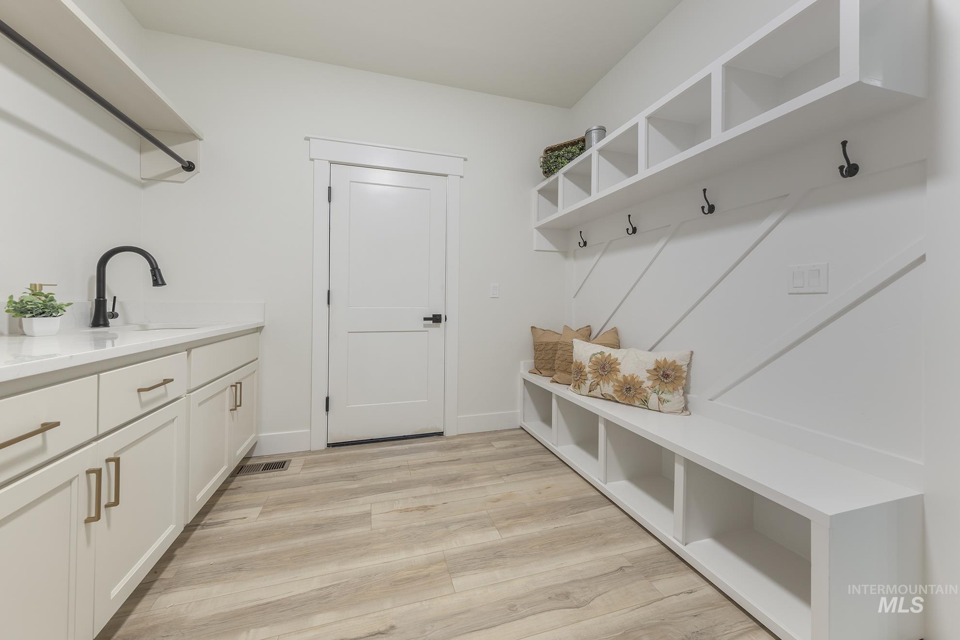 2810 Cypress Point Payette, ID 83661 - Photo 33 of 46 Mudroom featuring light wood finished floors and a sink