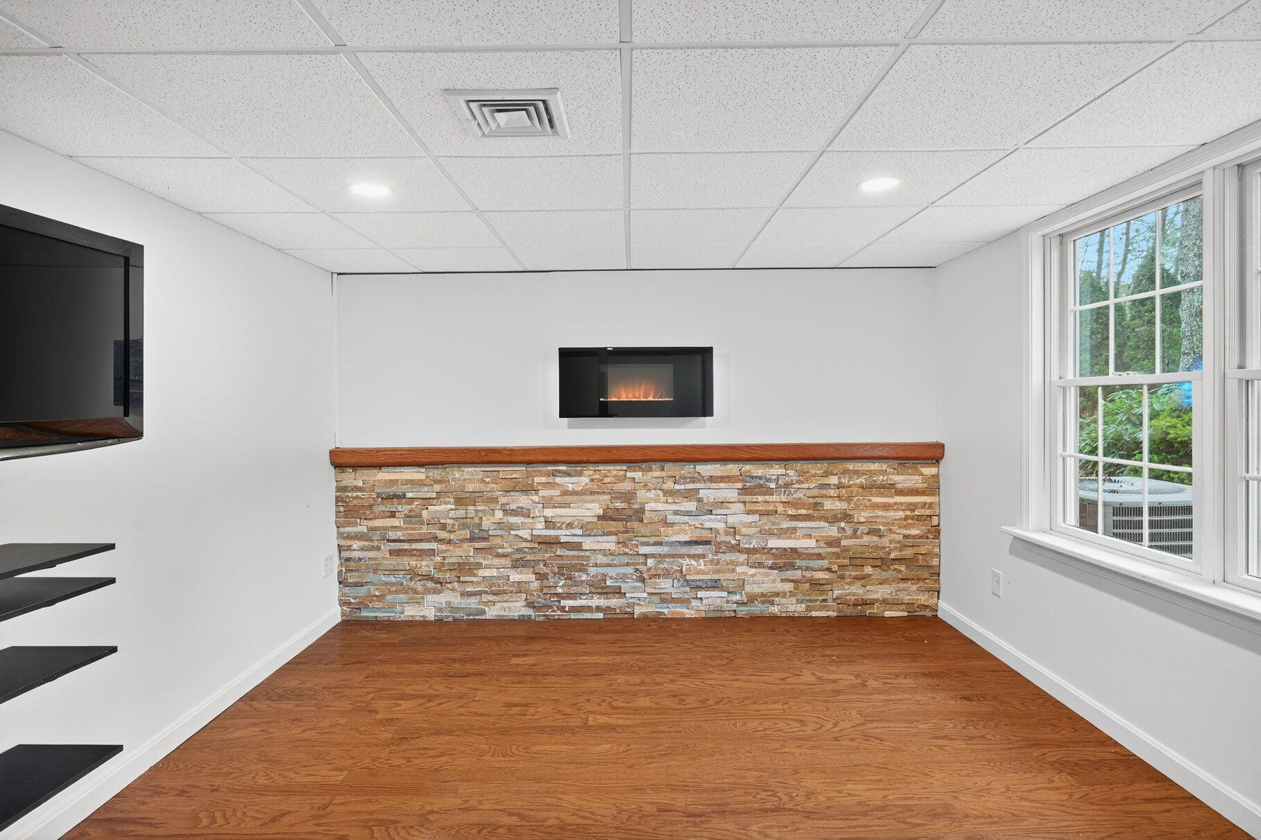 16 Gold Leaf Lane, Unit 16 Mashpee, MA 02649 - Photo 31 of 51 a view of empty room with wooden floor and fan
