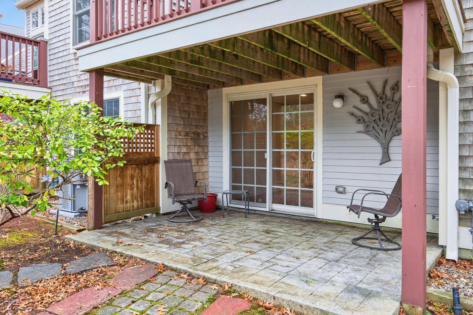16 Gold Leaf Lane, Unit 16 Mashpee, MA 02649 - Photo 34 of 51 a view of a house with a yard and sitting space