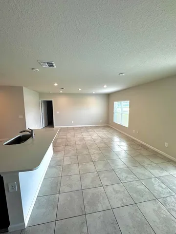 a bathroom with a sink and a shower