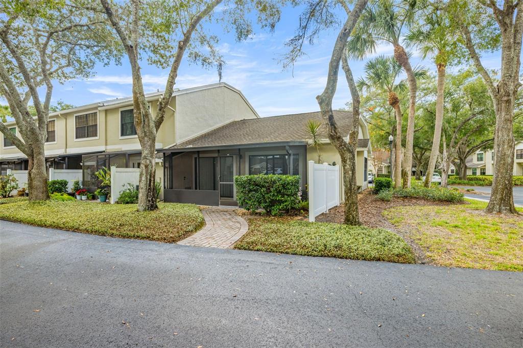 5100 Burchette Road, Unit 300 Tampa, FL 33647 - Photo 20 of 27 a front view of a house with garden