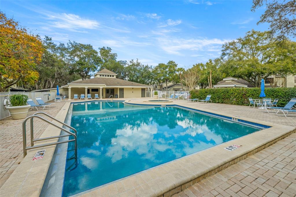 5100 Burchette Road, Unit 300 Tampa, FL 33647 - Photo 26 of 27 a view of a swimming pool with a yard