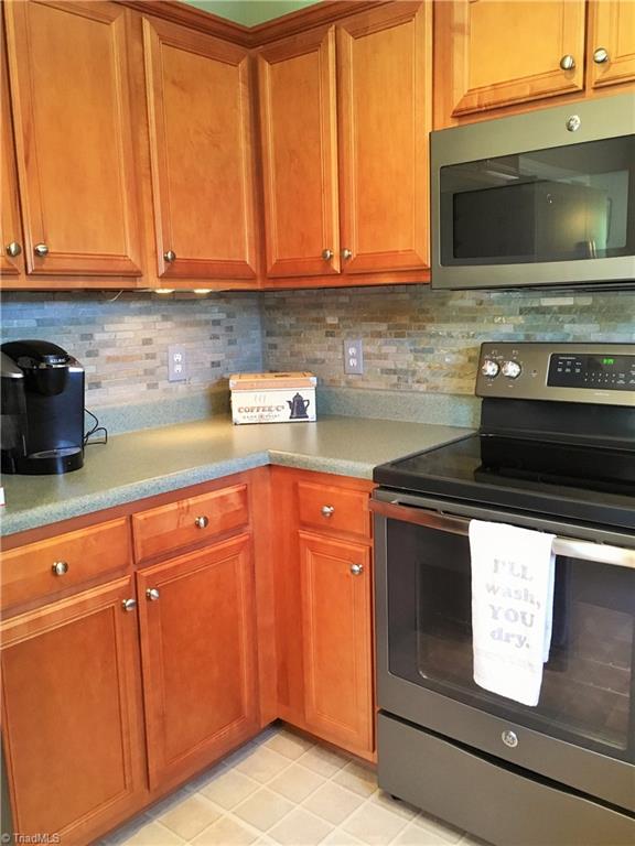 6028 Evans Mill Road High Point, NC 27265 - Photo 4 of 22 Very stylish back splash.