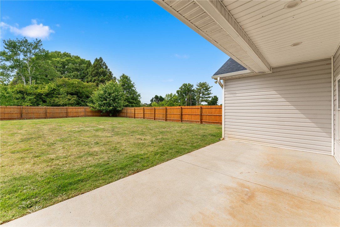 1411 Dunn Road Anderson, SC 29625 - Photo 28 of 30 This spacious yard offers a perfect canvas for outdoor living and entertaining.