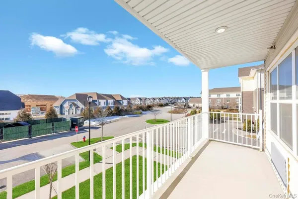 a view of a balcony with city view
