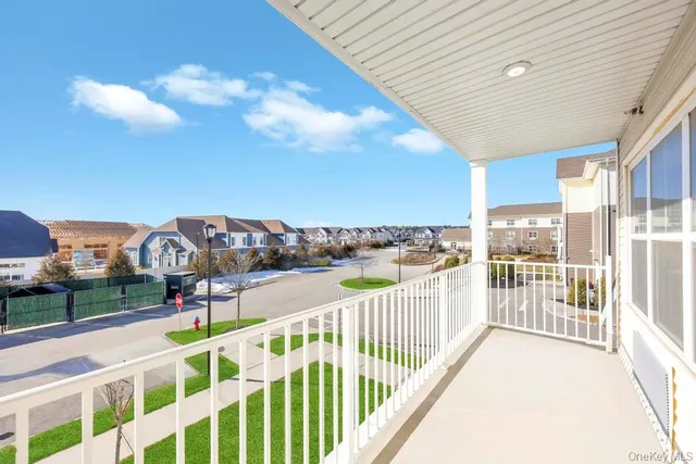 a view of a balcony with city view