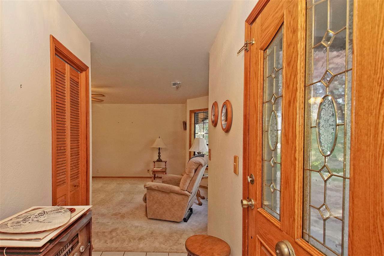 12455 Wilder Road Red Bluff, CA 96080 - Photo 22 of 73 a living room with furniture and a window