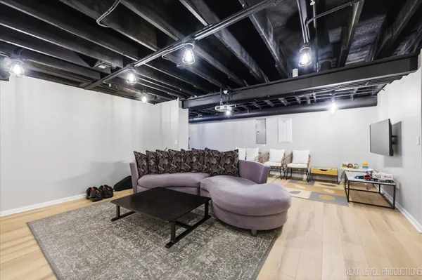 a living room with furniture a walk in closet