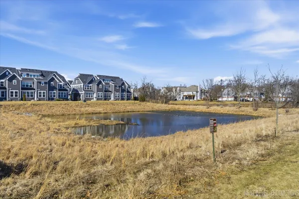 a view of a lake with houses