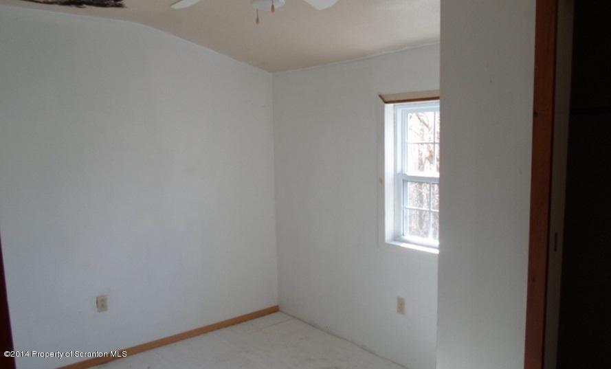 175 Tea Pond Nicholson, PA 18446 - Photo 11 of 14 an empty room with windows