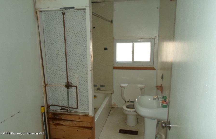 175 Tea Pond Nicholson, PA 18446 - Photo 12 of 14 a bathroom with a toilet and a sink