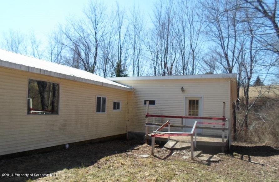 175 Tea Pond Nicholson, PA 18446 - Photo 3 of 14 a backyard of a house with outdoor seating
