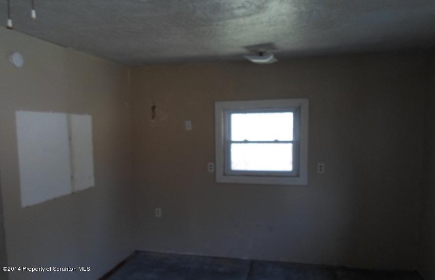 175 Tea Pond Nicholson, PA 18446 - Photo 6 of 14 an empty room with a window
