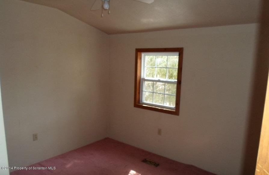 175 Tea Pond Nicholson, PA 18446 - Photo 8 of 14 an empty room with a window