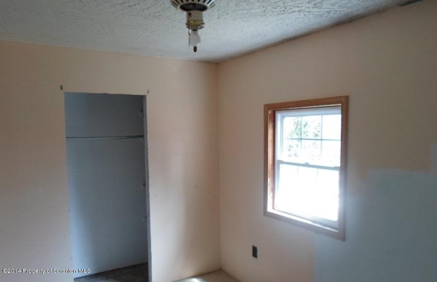 175 Tea Pond Nicholson, PA 18446 - Photo 9 of 14 a view of an empty room with a window