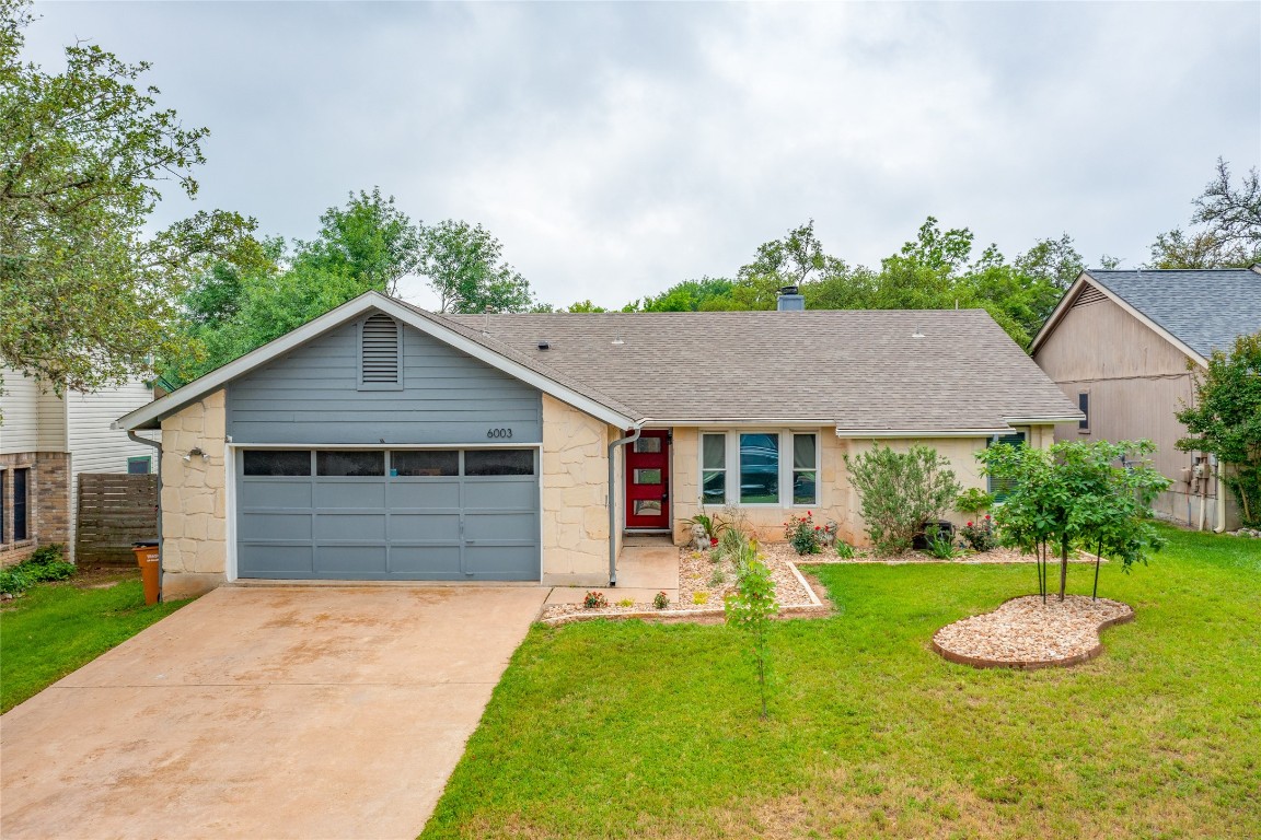 6003 Blanco River Pass Austin, TX 78749 - Photo 1 of 1 a front view of house with yard and green space