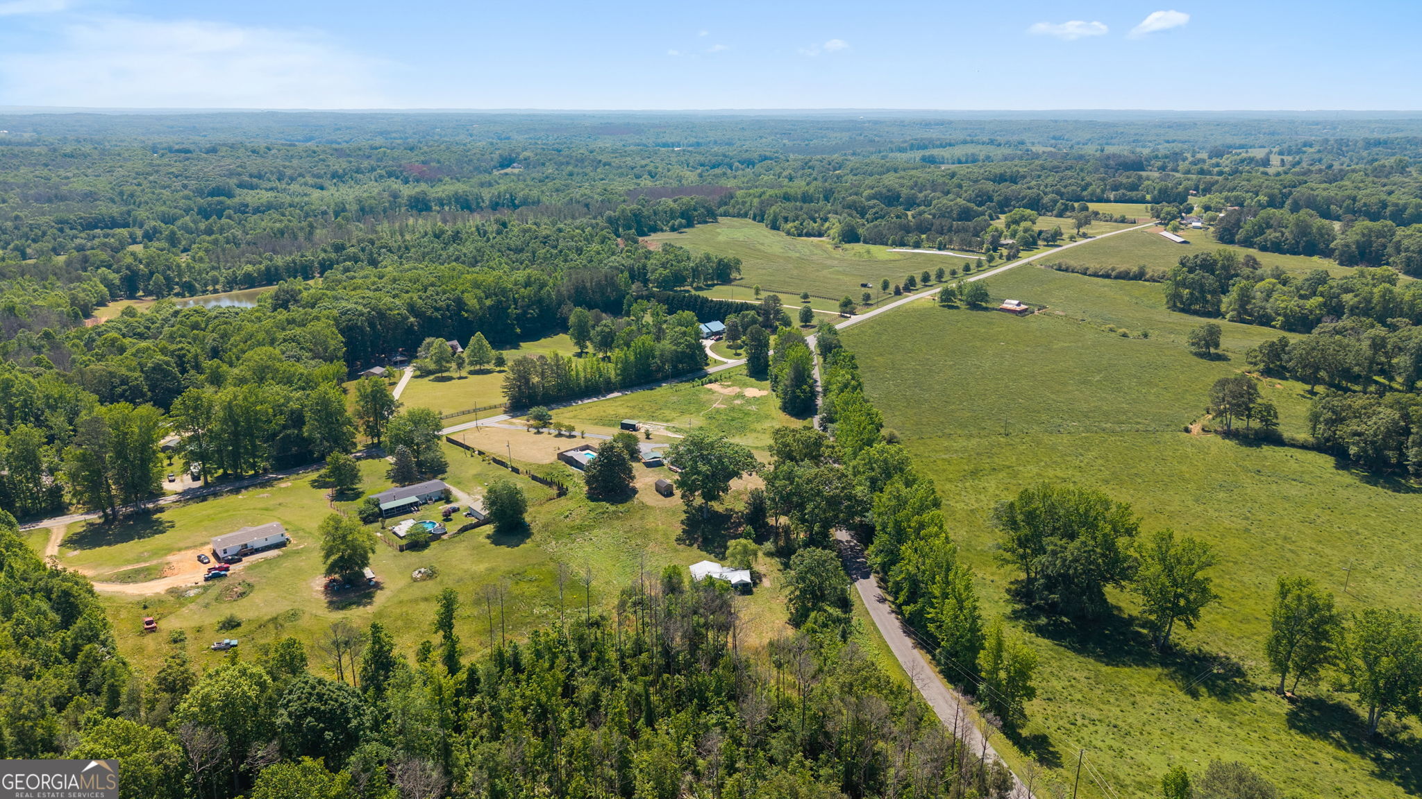 49 Frost Road Bowdon, GA 30108 - Photo 60 of 60 an aerial view of residential houses with outdoor space