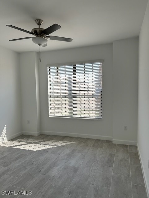 11156 Canopy Loop Fort Myers, FL 33913 - Photo 13 of 47 an empty room with wooden floor and windows