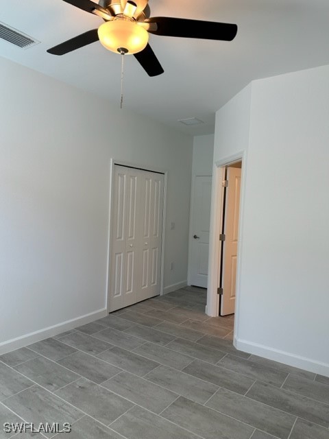 11156 Canopy Loop Fort Myers, FL 33913 - Photo 17 of 47 a view of an empty room with a chandelier fan