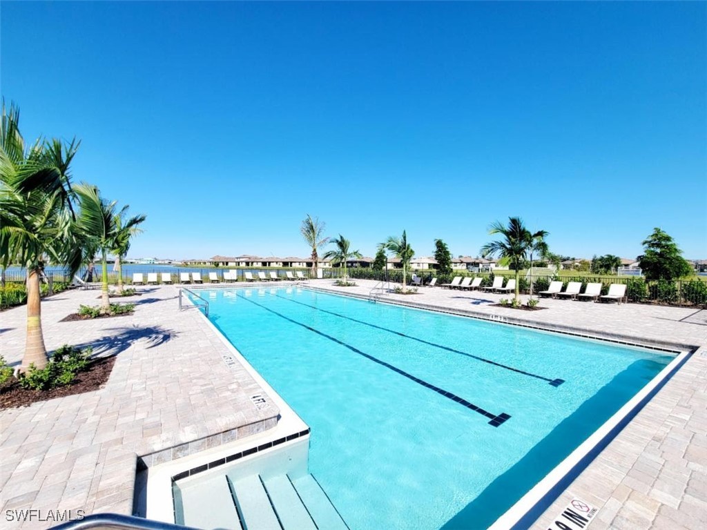 11156 Canopy Loop Fort Myers, FL 33913 - Photo 28 of 47 a wooden floor with a view of the ocean