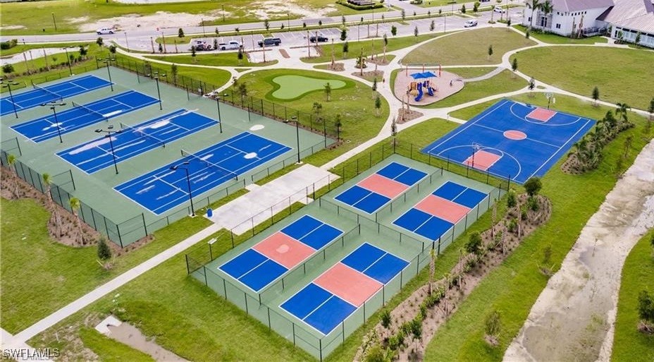 11156 Canopy Loop Fort Myers, FL 33913 - Photo 35 of 47 a aerial view of a pool that has a bed and a chair