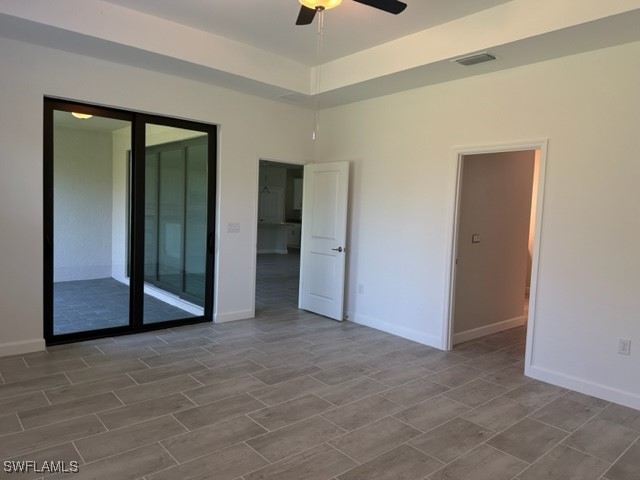 11156 Canopy Loop Fort Myers, FL 33913 - Photo 6 of 47 an empty room with closet and windows