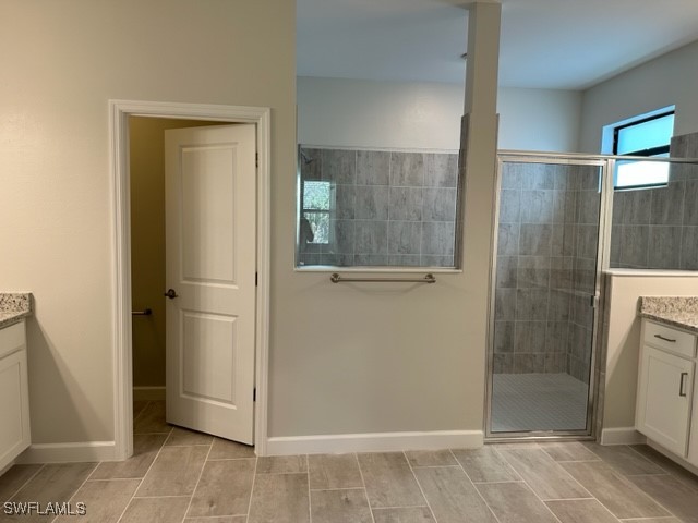11156 Canopy Loop Fort Myers, FL 33913 - Photo 8 of 47 a view of a bathroom with a glass door shower