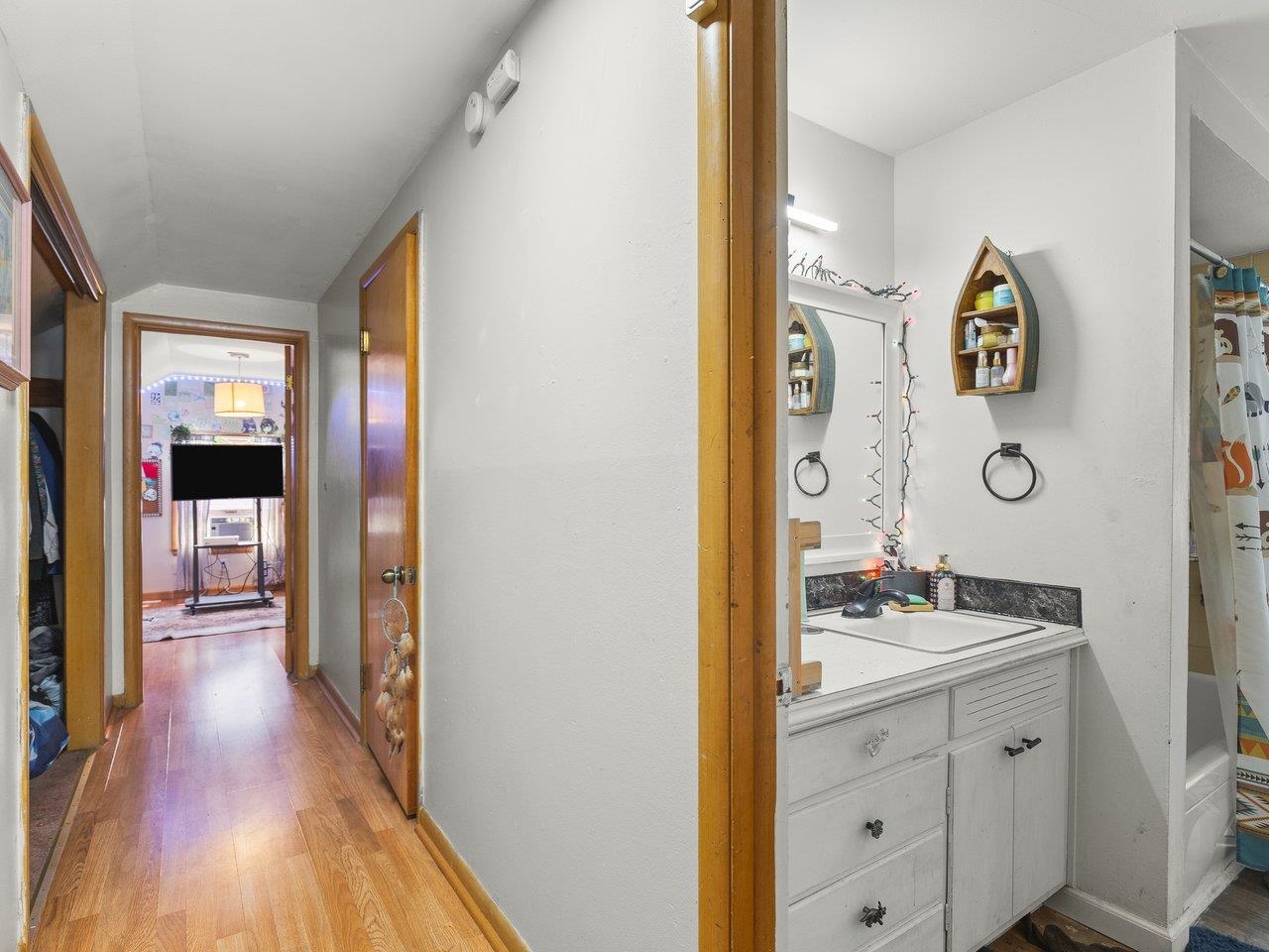 1930 North Alpine Road Rockford, IL 61107 - Photo 23 of 34 a hallway with sink and wooden floor