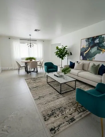 a living room with furniture and a table