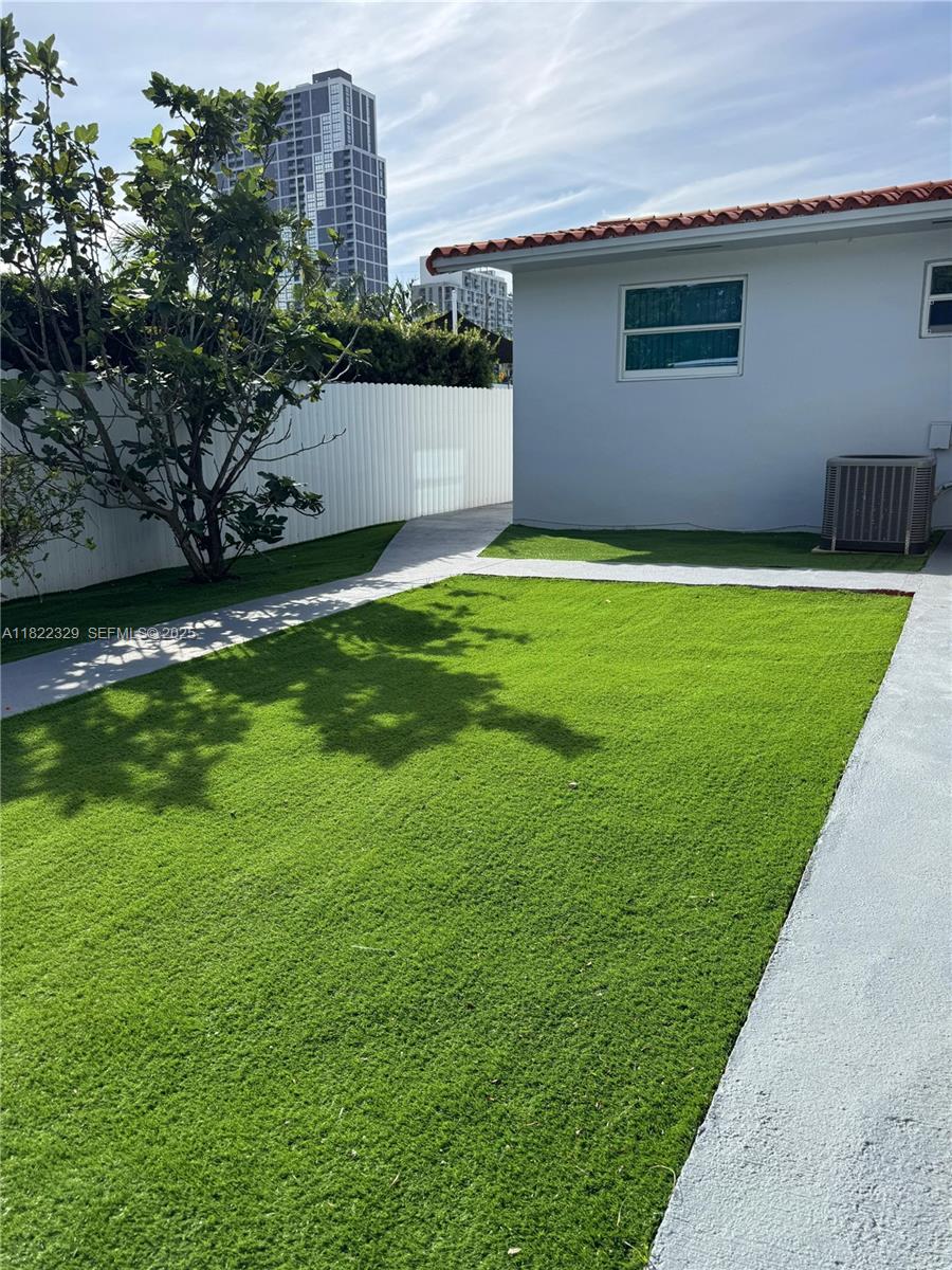 2941 Southwest 36th Avenue, Unit A Miami, FL 33133 - Photo 21 of 23 a view of a backyard