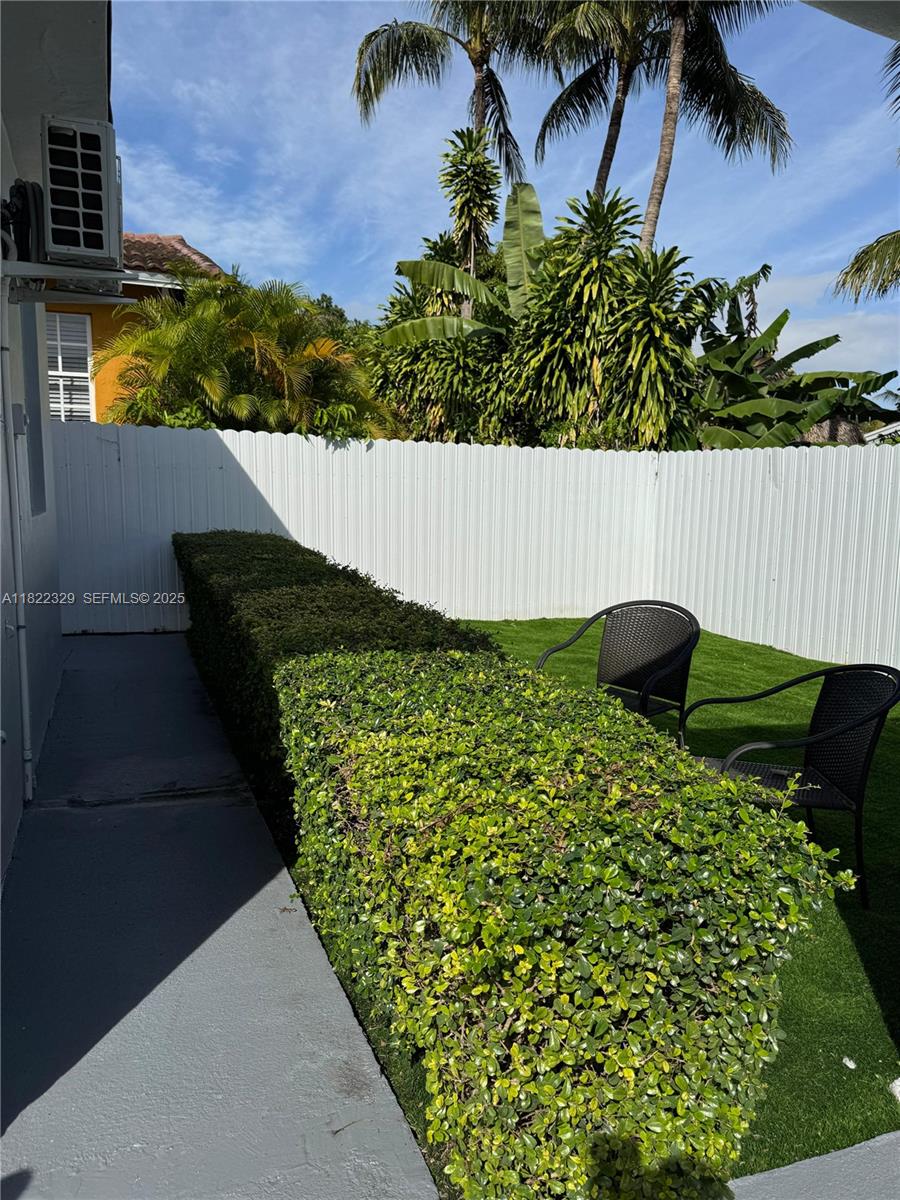 2941 Southwest 36th Avenue, Unit A Miami, FL 33133 - Photo 22 of 23 a view of a small yard