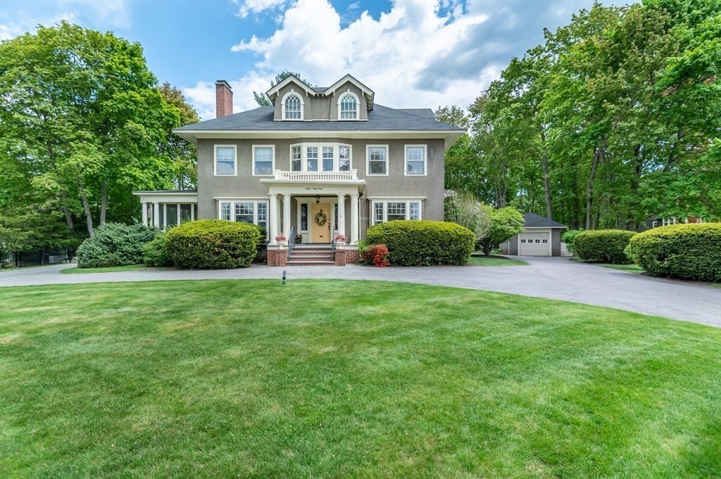 a view of a house with a garden