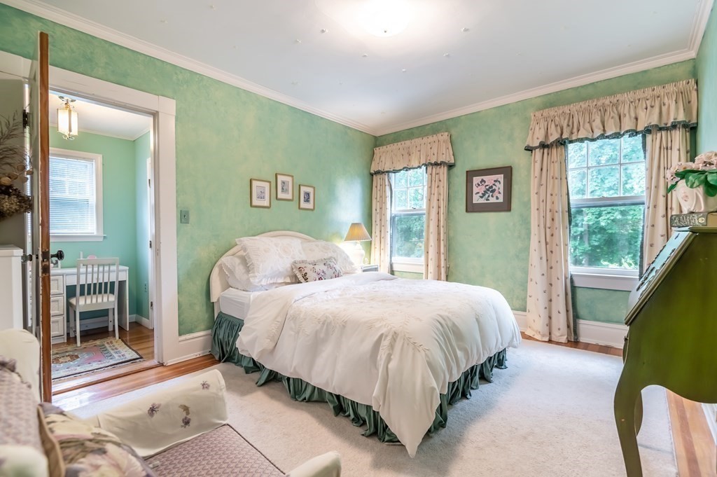 16 Hidden Road Andover, MA 01810 - Photo 24 of 42 a bedroom with a bed and a window