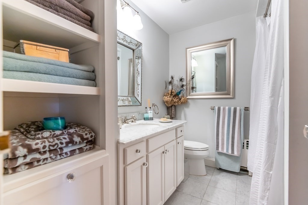 16 Hidden Road Andover, MA 01810 - Photo 26 of 42 a bathroom with a sink and a toilet