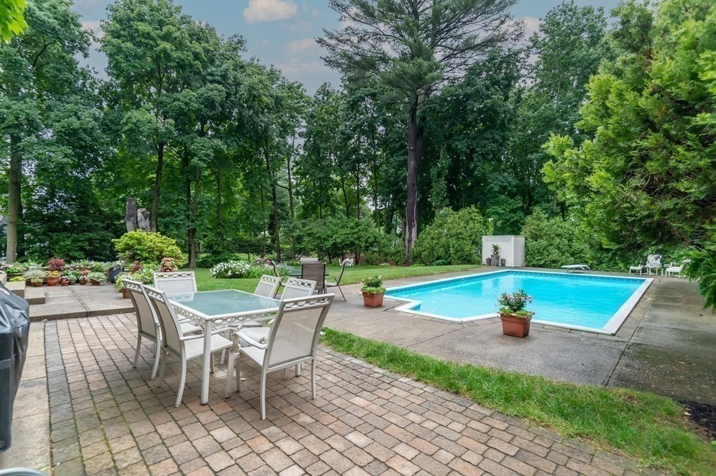 16 Hidden Road Andover, MA 01810 - Photo 35 of 42 an outdoor space with swimming pool and furniture