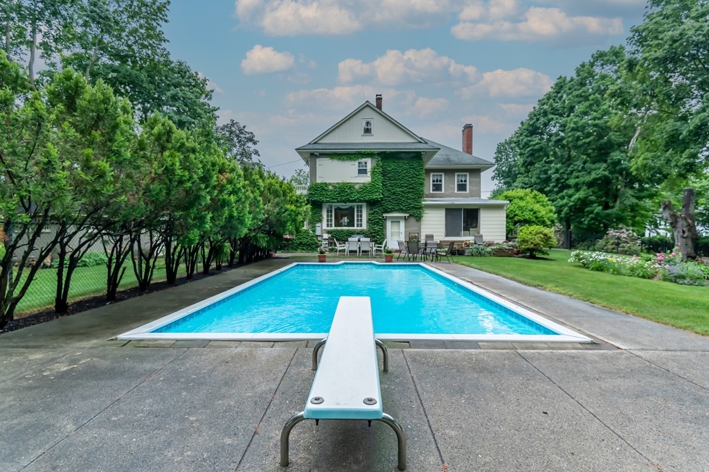 16 Hidden Road Andover, MA 01810 - Photo 36 of 42 a view of outdoor space yard swimming pool and patio