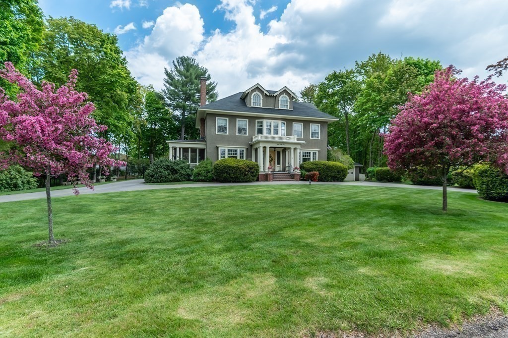16 Hidden Road Andover, MA 01810 - Photo 40 of 42 a front view of a house with a garden