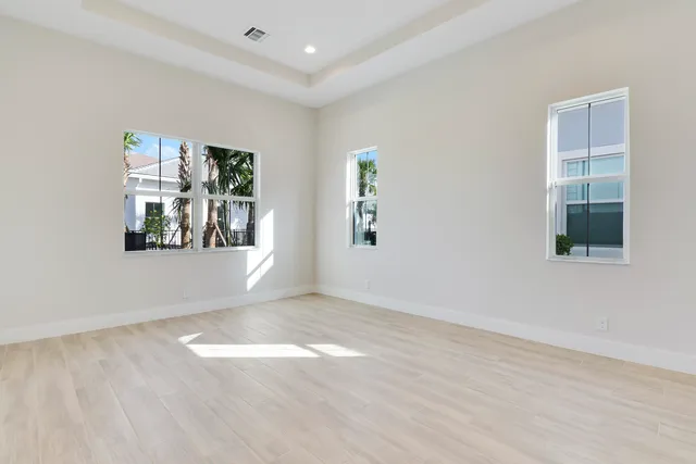 an empty room with windows