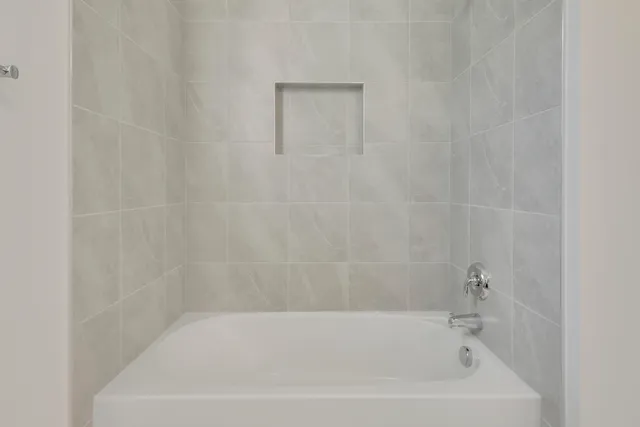 a bathroom with a bathtub