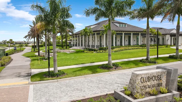 a view of a swimming pool with a table and chairs