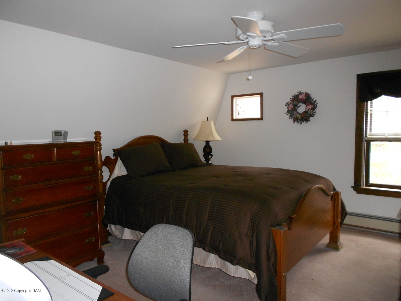 254 Five Springs Road Stroudsburg, PA 18360 - Photo 17 of 22 a bedroom with a bed and window
