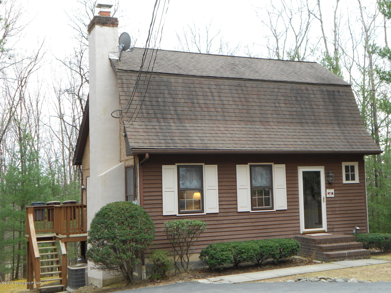 254 Five Springs Road Stroudsburg, PA 18360 - Photo 3 of 22 a front view of a house with a yard
