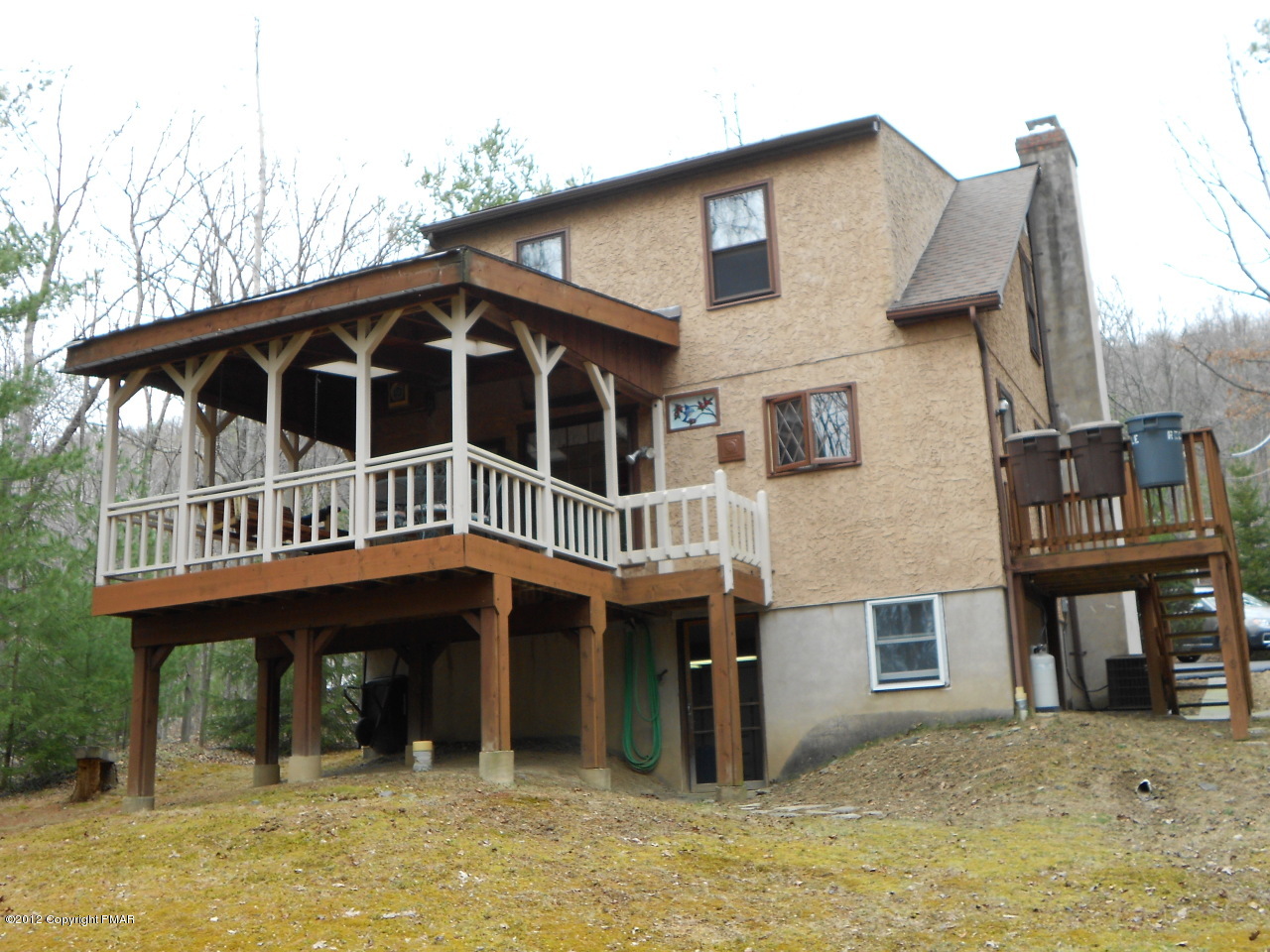 254 Five Springs Road Stroudsburg, PA 18360 - Photo 4 of 22 a front view of a house with balcony