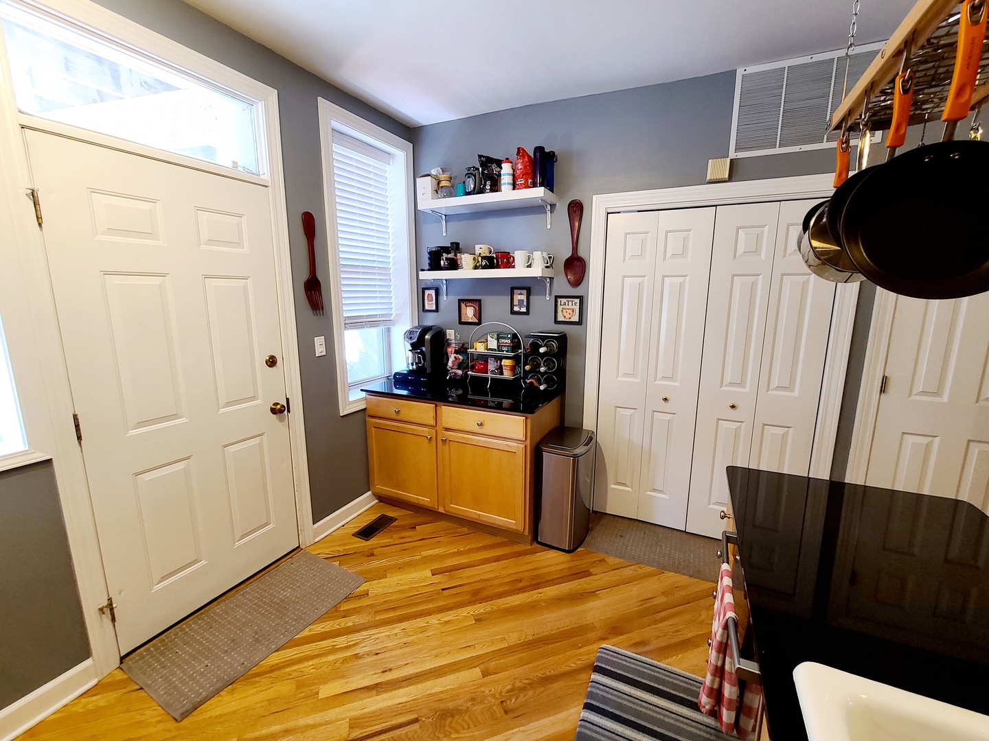 4634 North Racine Avenue, Unit 1 Chicago, IL 60640 - Photo 8 of 13 a bedroom with a bed and furniture