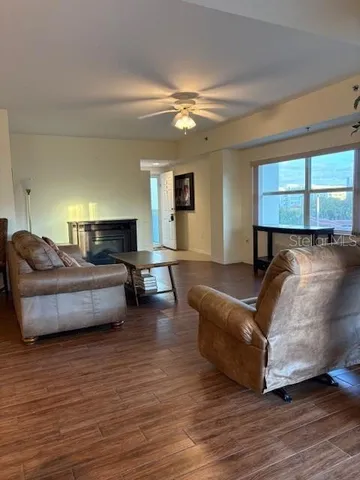 a room with furniture and wooden floor