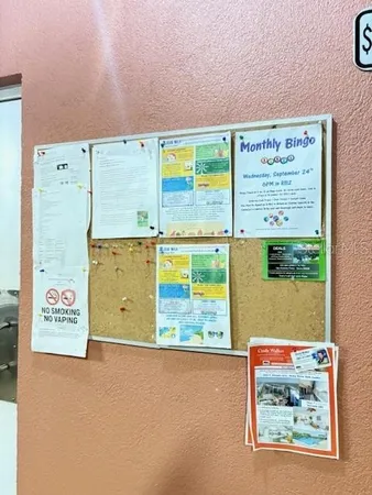 a room with gym equipment and a large window