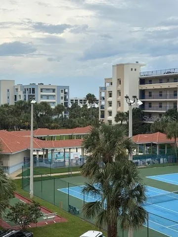 a room with gym equipment and a large window