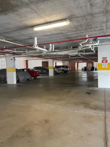 a house view with a swimming pool and glass chair
